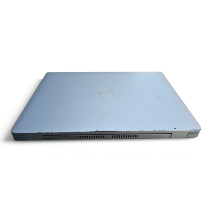The Computer Market Dell Latitude 5420 laptop closed view showing grey casing with visible cosmetic wear and tear