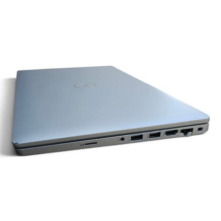 The Computer Market Dell Latitude 5420 laptop showing side ports including USB, HDMI, and Ethernet on a white background
