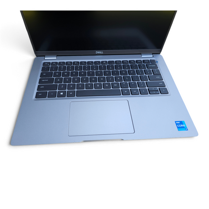 The Computer Market Dell Latitude 5420 14-inch laptop with grey chassis, black keyboard, and Intel Core i7 sticker.