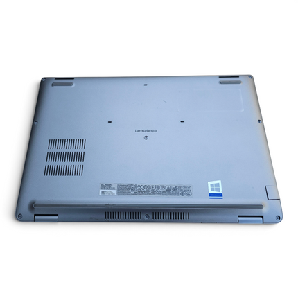 The Computer Market Dell Latitude 5420 laptop base view showing ventilation, product labels, and casing wear.