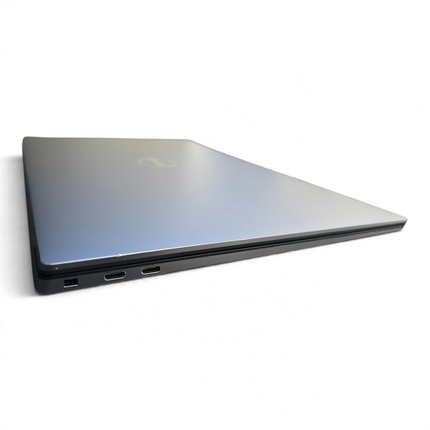 The Computer Market refurbished Dell Precision 5550 laptop in grey with visible side ports and sleek metal finish