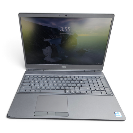 The Computer Market Dell Precision 7560 laptop with grey casing, 15.6-inch screen, and visible wear on the palm rest.