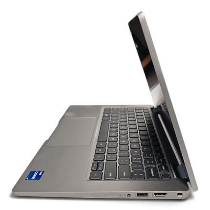 The Computer Market Dell Latitude 5320 13.3-inch touchscreen laptop viewed from the side showing ports and keyboard.
